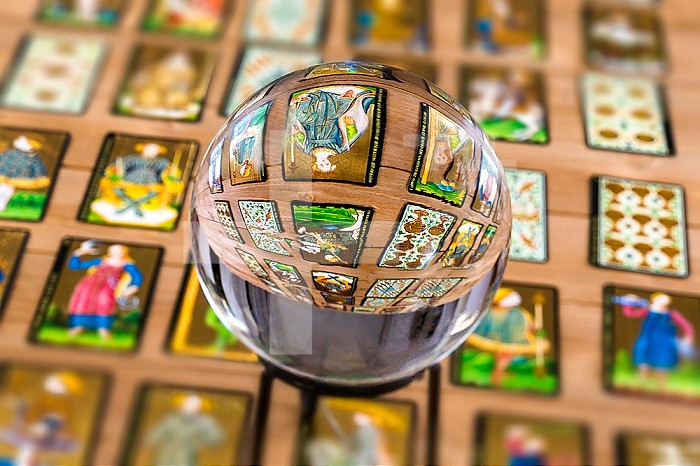 Fortune teller Crystal ball and in transparency tarot cards