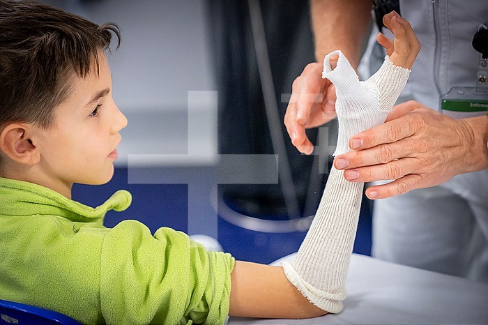10 year old child plastered for a broken thumb.