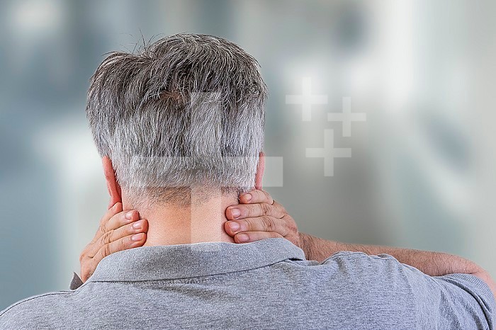 Neck Pain.Medical concept. Senior man touches neck, pain in the neck,