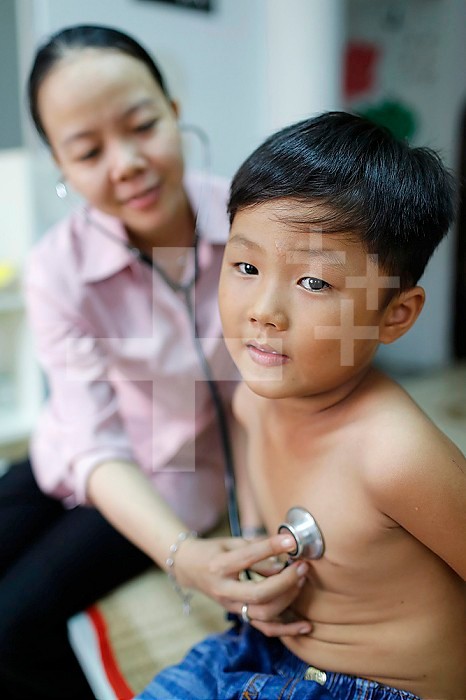 French NGO Chaine de l´Espoir. Children´s pavilion. Child suffering of heart disease. Medical consultation. Ho Chi Minh City. Vietnam.