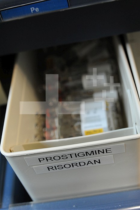 Medical intensive care unit at Jacques Cartier Hospital in Massy. Nurse and caregiver replenish stocks in the service pharmacy (Furosemide, Heparin, Ceftriaxone, cephalosporin antibiotic) used for patients with Covid 19. Prostigmine tray, Risordan.