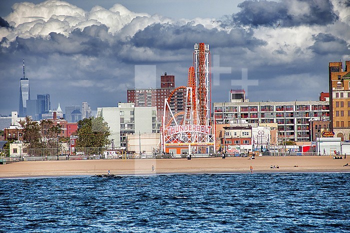 Coney Island Amusement Park with Manhattan in the distance, Brooklyn, New York City, NYC, United States, USA, America.
