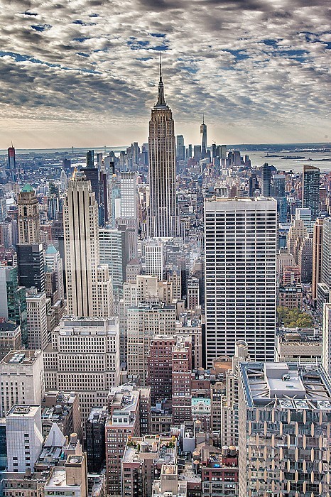 View of the Empire State building and Manhattan, vertical, New York City, NYC, United States, USA, America.
