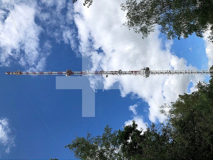 Telecommunications antenna in the forest, Fleury, Hauts-de-France, France.