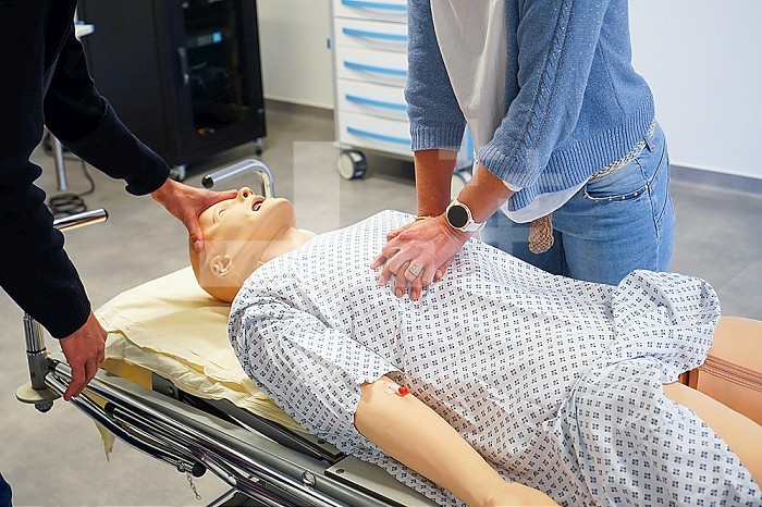 Resuscitation training on a dummy. Various health professionals are trained in the evolution of practices, care and emergency procedures within the Faculty of Medicine of Montpellier. They must work on serious cases of daily life faithfully reproduced on a SimMan dummy. Here, respiratory arrest on a man in his forties. Attempt to resuscitate with cardiac massage.