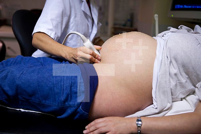 Ultrasound scan of a pregnant woman at 8 months of pregnancy in the maternity ward of a hospital.