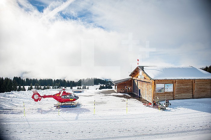 The trackers ensure the safety of the slopes for the skiers and the first aid.