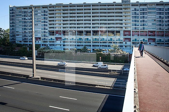 Residential building on the edge of a city ring road or highway.