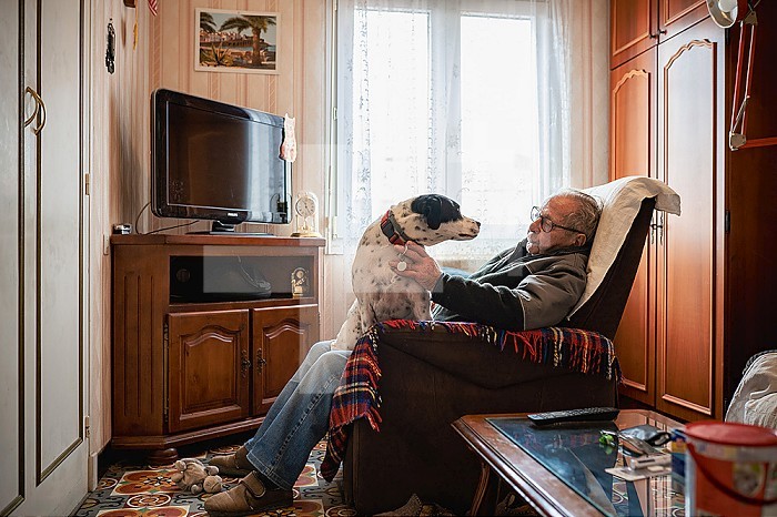 90 year old senior living at home with his dog.
