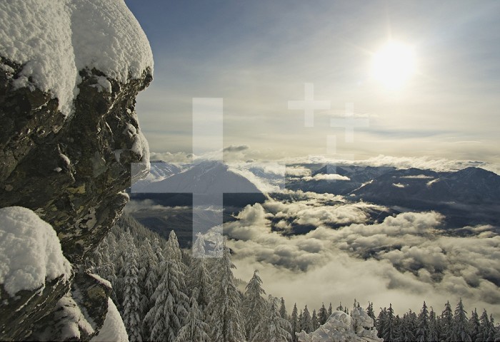 Winter landscape of new snow and diffused sunshine on the haystack summit of Mount Si near North Bend in January, Cascade Range, Washington, USA.