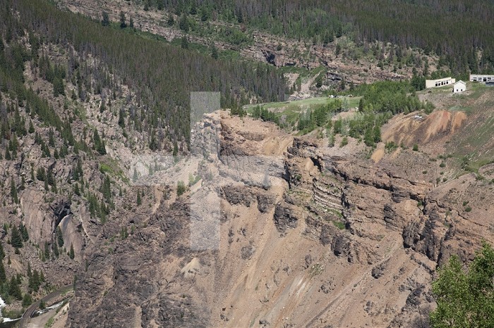 Great Unconformity between Cambrian Sandstone and Precambrian basement metamorphic rock along the Eagle River, Colorado, USA.  Note the old mine workings.