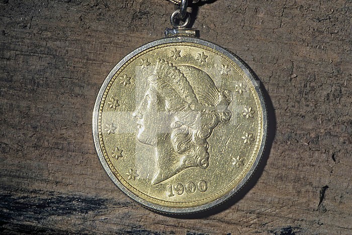 Gold coin, $10.00 eagle, composed of 90% Gold and 10% Copper.