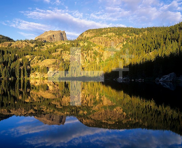Hallet Peak and Flattop Mountain reflected in Bear Lake, Rocky Mountains National Park, Colorado, USA.
