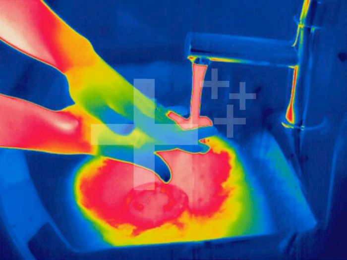 Thermogram - Washing hands with hot water - The colors show temperature variation. The temperature scale runs from white (warmest) through red, yellow, green and cyan, blue and black (coldest)