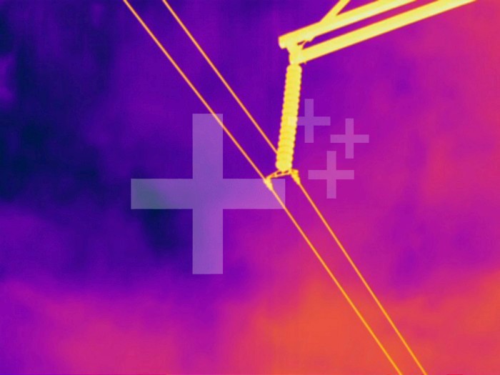 Thermogram - High voltage power line - The colors show temperature variation. The temperature scale runs from white (warmest) through yellow, orange, red, purple and black (coldest)