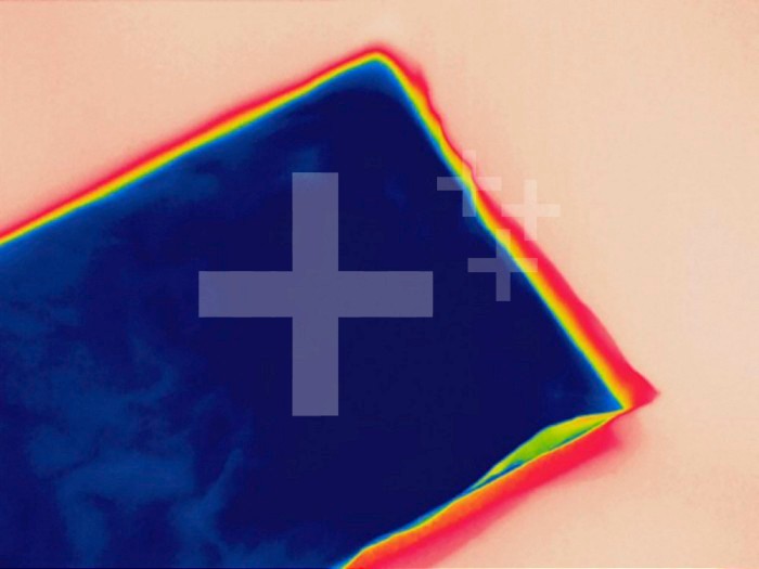 Thermogram of a cold ice pack. The colors show temperature variation with the temperature scale running from white (warmest) through red, yellow, green and cyan, blue and black (coldest).
