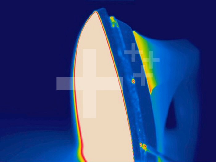 Thermogram of a hot iron. The colors show temperature variation with the temperature scale running from white (warmest) through red, yellow, green and cyan, blue and black (coldest).