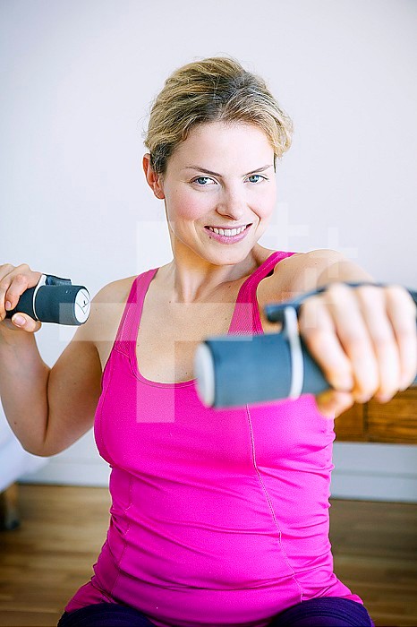 Woman practicing gym at home.