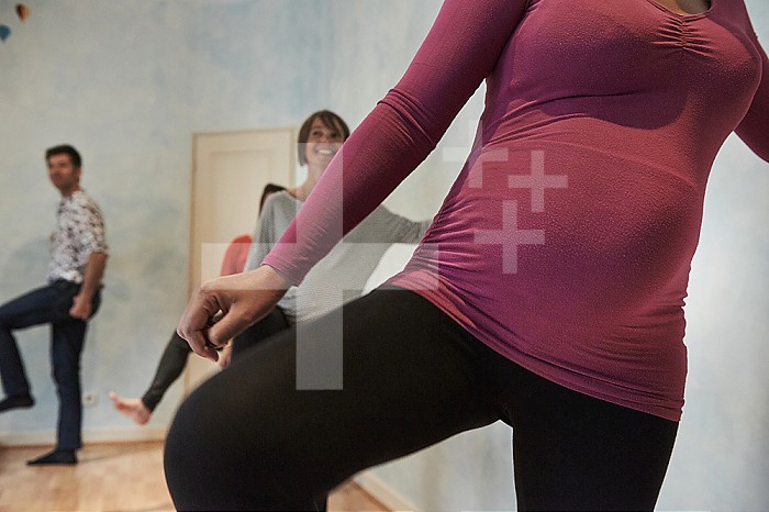 Reportage on a midwife practice in Lyon, France during antenatal classes. Future mothers learn to appreciate muscle relaxation.