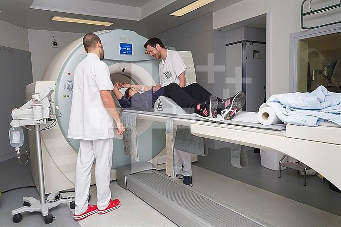 Reportage on PET imaging at the Antoine-Lacassagne Cancer centre in Nice, France. Positron Emission Tomography, or PET scan, is used in diagnosing and monitoring patients with cancer. This method enables tumours to be detected using a radioactive tracer, which accumulates heavily in cells that present a pathological hypermetabolism.